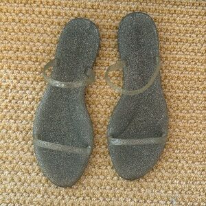 Gently worn clear with silver sparkle Stuart Weitzman jelly sandals